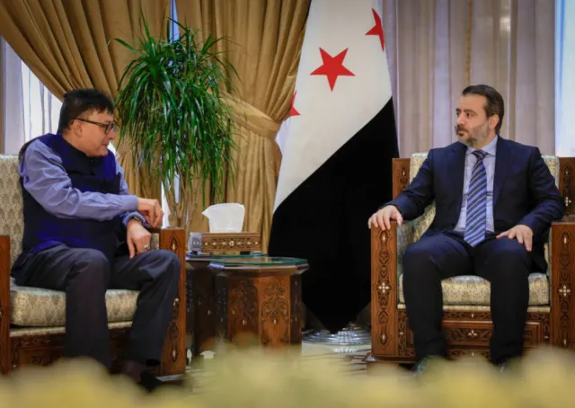 Minister of Foreign Affairs and Expatriates Asaad Hassan Al-Shaibani Meets with UNDP Resident Representative