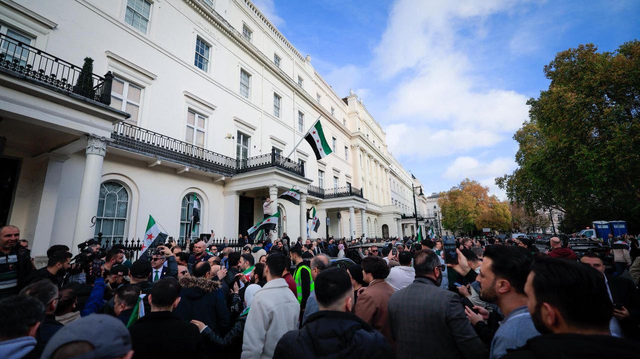 Foreign Minister and Expatriates  al-Shaibani Raises The flag of The Syrian Arab Republic above The Syrian Embassy Building in The British Capital, London