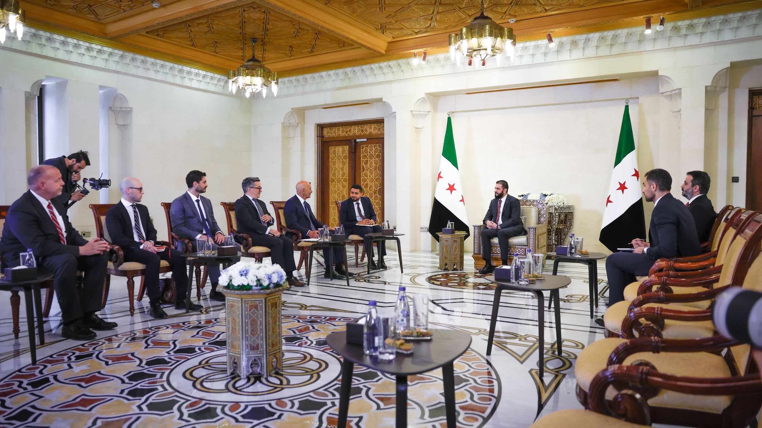 .His Excellency the President of the Syrian Arab Republic, Mr. Ahmad Al-Shara, meets with the US Special Envoy to Syria, Mr. Thomas Barrack
