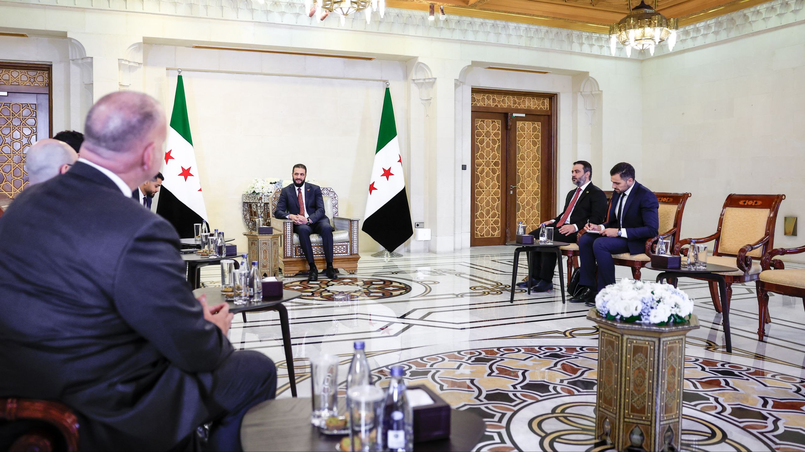 .His Excellency the President of the Syrian Arab Republic, Mr. Ahmad Al-Shara, meets with the US Special Envoy to Syria, Mr. Thomas Barrack