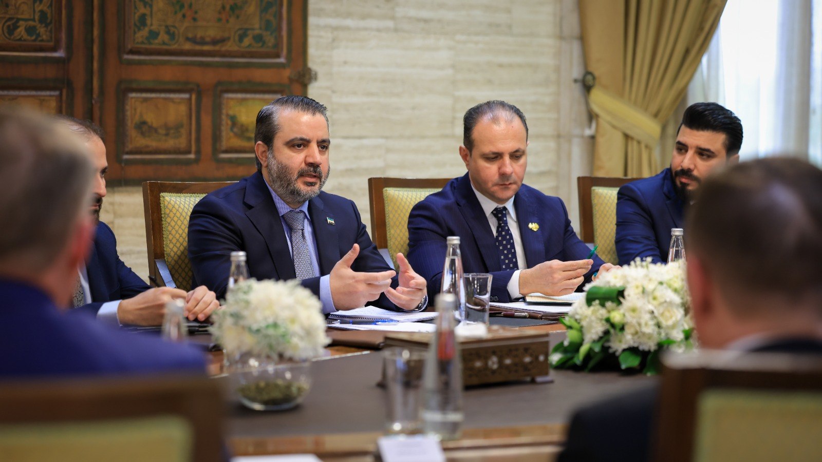 Minister of Foreign Affairs and Expatriates Asaad Hassan Al-Shaibani meets with Russian Deputy Prime Minister Alexander Novak