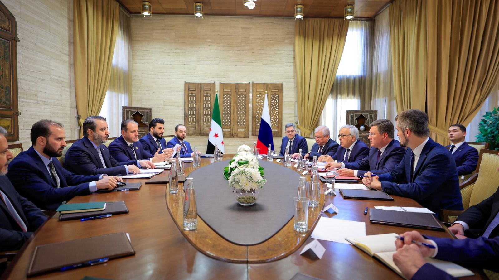 Minister of Foreign Affairs and Expatriates Asaad Hassan Al-Shaibani meets with Russian Deputy Prime Minister Alexander Novak
